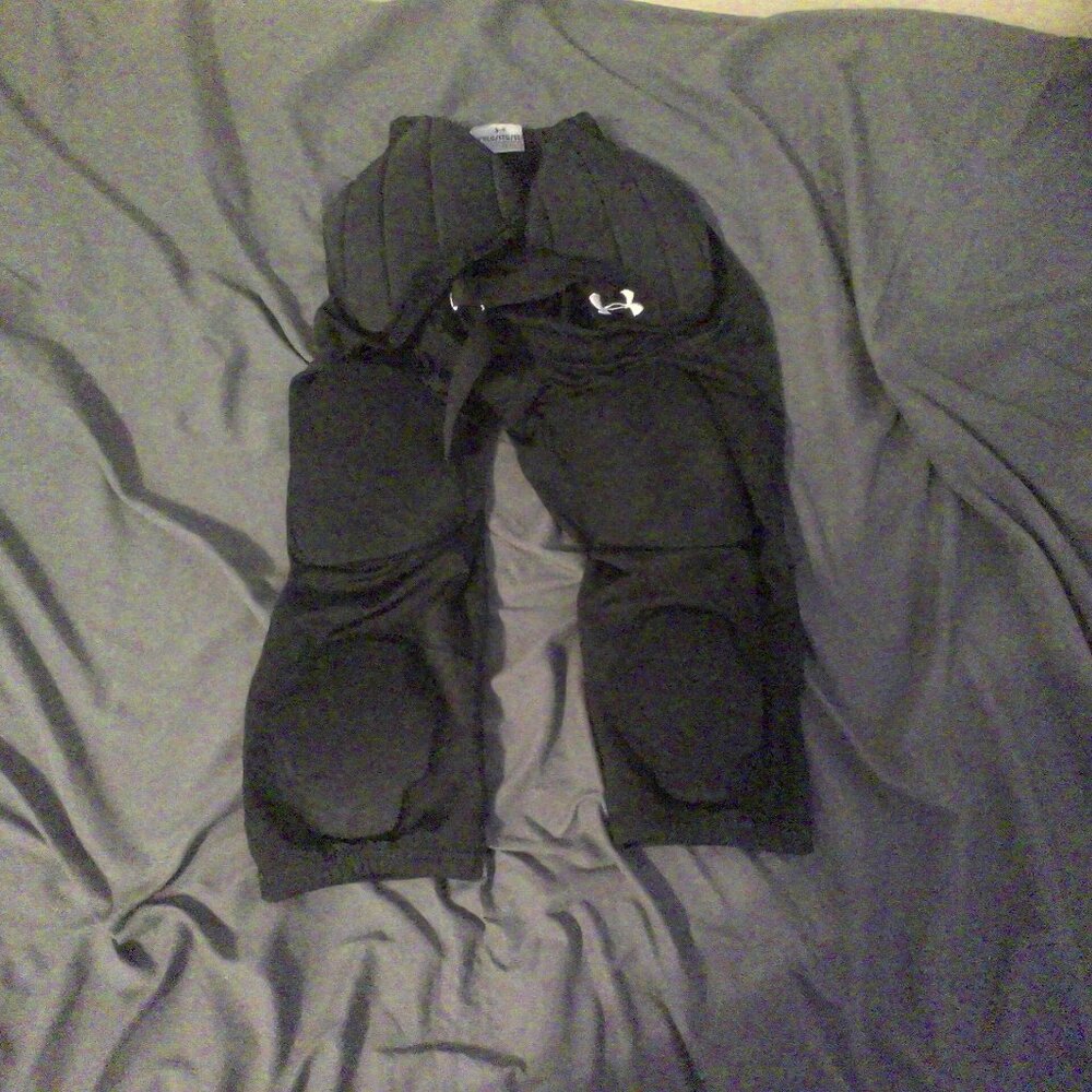 Black under Armor football pants